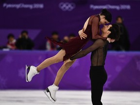 Canada's Tessa Virtue and Canada's Scott Moir compete in the ice dance free dance of the figure skating event during the Pyeongchang 2018 Winter Olympic Games at the Gangneung Ice Arena in Gangneung on February 20, 2018. (AFP PHOTO / ARIS MESSINIS)