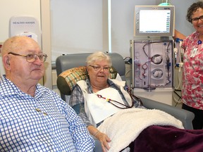 Denise Corneil, continuity nurse at the Chatham Kent Health Alliance satellite dialysis unit, and dialysis patient Nancy Seney and her husband Jim, are pleased three chairs are being added so more local residents can receive the vital service. Ellwood Shreve/Postmedia Network