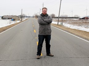 South Kent Coun. Trevor Thompson stands on Erieau Road, which leads into the lakeside community of Erieau. Ellwood Shreve/Postmedia Network
