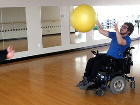 Cristian Picard, 23, is feeling better both physically and mentally thanks to working with personal trainer Donna Lashmore at the Chatham-Kent YMCA. Ellwood Shreve/Postmedia Network