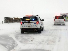 Hanna RCMP, Hanna Fire Department and EMS respond to a water truck rollover on Feb. 14 due to blowing snow and poor road conditions. Photo courtesy of Hanna RCMP