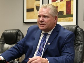 Jason Miller/The Intelligencer 
PC leadership hopeful, Doug Ford, speaks to reporters before his public address in Belleville Tuesday.