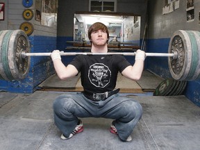 Joel Asselin, a member of the Sudbury Weightlifting Club trains in Sudbury, Ont. on Wednesday January 17, 2018. Asselin represented Ontario at the Canadian Junior Weightlifting Championships in Halifax this weekend. Gino Donato/Sudbury Star/Postmedia Network
