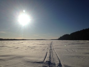 The sun drops over Panache Lake on a recent weekend. On Saturday afternoon a young Sudbury woman was tragically killed in a snowmobile crash. (Jim Moodie/Sudbury Star)