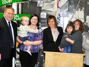 A $6.3 million early years program announcement was made at Upper Thames Elementary School (UTES) in Mitchell last Wednesday, Feb. 21. Participating in the announcement were Stratford Mayor Dan Mathieson (left), Miles Walkom being held by Rose Trachsel, of Perth Care for Kids; AMDSB Director Lisa Walsh, Pam Shewan of Perth Care for Kids holding Dana Wolfe, and Huron County Social Services Manager Michele Gaynor holding Malea Walkom. ANDY BADER/MITCHELL ADVOCATE