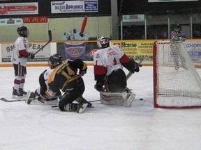 The Exeter Hawks will face off against the Dorchester Dolphins on Fri., Feb. 23 in game one of their second round series at the South Huron Rec Centre at 8 p.m. Above, Hawks forward Jon Baker scores a first period goal from his knees late in the period against the Port Stanley Sailors in game five of their series.The goal put the Hawks up 2-1 on the way to a 4-1 win. The Hawks won the series 4-2.