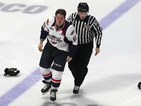 Luke Boka heads to the penalty box after getting in a fight during a game on Thursday, November 30, 2017, at the WFCU Centre in Windsor, ON. against the North Bay Battalion. (DAN JANISSE/The Windsor Star)