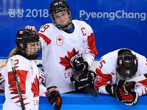 Canada's Meghan Agosta (2) and Marie-Philip Poulin (29) react after losing to the United States in a shootout in the women's gold-medal game at the 2018 Olympic Winter Games in Gangneung, South Korea, on Thursday, February 22, 2018. (NATHAN DENETTE/The Canadian Press)