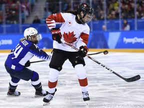 Canada’s Rebecca Johnston (right) of Sudbury controls the puck as USA’s Brianna Decker chases in the women’s gold medal ice hockey match between Canada and the US during the Pyeongchang 2018 Winter Olympic Games at the Gangneung Hockey Centre in Gangneung on February 22, 2018. Brendan Smialowski/AFP/Getty Images