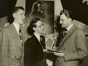 Evangelist Billy Graham (right), who died Wednesday at age 99, spoke in Chatham on Jan. 27, 1949 in the auditorium of the former Chatham Vocational School. With him in this photograph were Leighton Ford and Dan Goldsmith, both of Chatham. Ford would become an evangelist and at one time the head of the Billy Graham Evangelistic Association in Canada; he would also marry Graham’s younger sister, Jean. Goldsmith would become a Christian pastor. Handout/Postmedia Network