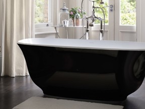 A free-standing tub visually occupies less space, making it ideal for a compact layout. (Courtesy of www.vandabath.com)