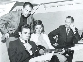 London?s Saul Holiff is shown with Johnny Cash and June Carter Cash. Holiff managed the country star from 1960 to 1973. (File photo)