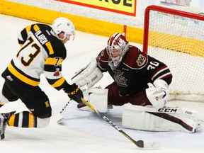 Peterborough Petes' goalie Dylan Wells closes the door on Kingston Frontenacs' Gabriel Vilardi during second period OHL action on Thursday at the Memorial Centre in Peterborough. CLIFFORD SKARSTEDT/Postmedia Network