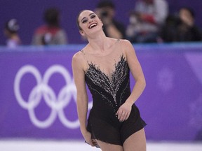 Canada's Kaetlyn Osmond reacts at the end of her performance in the women's figure skating free program at the Pyeongchang Winter Olympics Friday. THE CANADIAN PRESS/Paul Chiasson