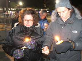 Around 30 people attended Thursday’s vigil in downtown Sarnia. (Carl Hnatyshyn/Postmedia News)