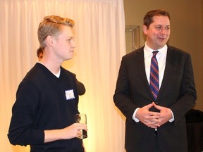 Ellwood Shreve/Postmedia News
Ethan Gilhula, left, was among the local Conservative supporters who had the chance to meet Conservative Party of Canada leader Andrew Scheer during a stop in Chatham on Thursday. Ellwood Shreve/Postmedia News