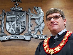 Luke Hendry/The Intelligencer
Hastings County Warden Rodney Cooney stands in the council chamber Thursday in Belleville. The county's municipalities oppose the concept of firefighters trained as paramedics working double duty.