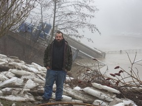 Dump truck driver Scott Barber escaped unharmed after the Imperial Road bridge in Port Bruce collapsed into Catfish Creek as he drove across it.  (DEREK RUTTAN, The London Free Press)