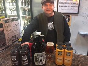 Jeff Pastorius, one of the founders of London Brewing Co-Op, shows off some of his work at the brewery. The east London business is one of 33 in Southwestern Ontario to share $2.1 million in government money to grow their businesses. (Norman De Bono, The London Free Press)