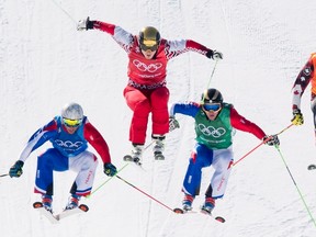 Canada's Dave Duncan races against Olympic athlete from Russia, Sergey Ridzik, Fraancois Place of France and JF Chapuis of France during quarter-finals of men's ski cross at Phoenix Snow Park during the Pyeongchang 2018 Winter Olympic Games in South Korea, Wednesday.
THE CANADIAN PRESS/Jonathan Hayward