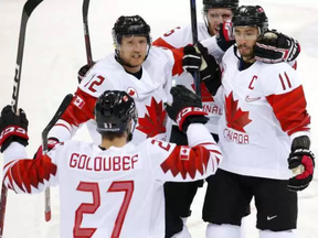 Canadian players celebrate a Chris Kelly (right) goal against the Czech Republic in the men’s hockey bronze-medal game at the Pyeongchang Olympics on Feb. 24.