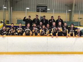 Members of the Mitchell Bantam LL hockey team celebrate their championship of the Wallaceburg tournament over the Family Day weekend. SUBMITTED