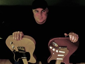 Four Barrel Blues Band's Chris Jenniskens shows off a pair of six-strings. The band will be playing during First Friday festivities at Cheeky Monkey on Mar. 2. 
Handout/Sarnia This Week