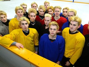 Members of the London Junior Knights minor-midget team take a break from practice at Silverwoods Arena to model their dyed yellow hair in preparation for the OHL Cup championship tournament. (MORRIS LAMONT, The London Free Press)
