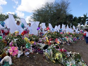 The memorial outside Marjory Stoneman Douglas High School in Parkland, Fla. (AP photo)