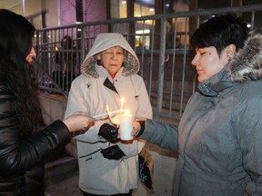 Vanessa Gray, Ada Plain and Lindsay Gray light candles in front of Sarnia City Hall at a vigil held Feb. 22 in honour of Colten Boushie, a Cree Red Pheasant First Nation resident killed in Saskatchewan in August 2016.
CARL HNATYSHYN/SARNIA THIS WEEK