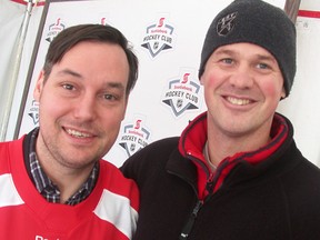 A pair of former Belleville Bulls, Kyle Wellwood (left) and Matt Coughlin, share a few laughs at last weekend's Rogers Hometown Hockey Tour stop in downtown Belleville. (Paul Svoboda/The Intelligencer)