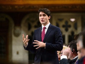 Prime Minister Justin Trudeau stands during question period on Parliament Hill in Ottawa on Wednesday, Feb. 28, 2018. THE CANADIAN PRESS/Sean Kilpatrick