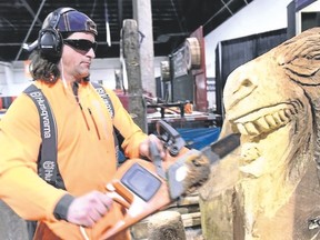 Chainsaw artist Kevin Lewis will be chipping away daily at the sportsmen?s show.