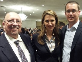 Ontario Tory leadership hopeful Caroline Mulroney is flanked by Sarnia-Lambton MPP Bob Bailey, left, and Monte McNaughton, MPP for Lambton-Kent-Middlesex, during a recent visit to London. Mulroney is set to visit Point Edward Saturday during a tour of southwestern Ontario. )File photo/The London Free Press)