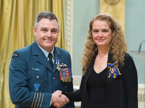Photo by Sgt. Johanie Maheu/Rideau Hall
Gov. Gen. Julie Payette presents the Meritorious Service Cross (Military Division) to Col. Daniel Constable on Wednesday at Rideau Hall.