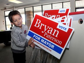 Judah Paterson, five, helped clean up his now Mayor Bryan Paterson's campaign headquarters after the conclusion of the 2014 Kingston municipal election. IAN MACALPINE-KINGSTON WHIG-STANDARD