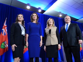 Ontario PC leadership candidates Tanya Granic Allen, Caroline Mulroney, Christine Elliott and Doug Ford pose for a photo after participating in a debate in Ottawa on Wednesday, Feb. 28, 2018. THE CANADIAN PRESS