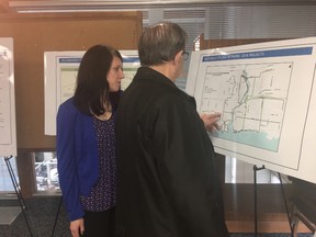 BRUCE BELL/THE INTELLIGENCER
Deanna O’Leary, senior project manager for Belleville’s Cycling Network, explains some of the proposed routes to Coun. Garnet Thompson during an open house at city hall on Thursday.