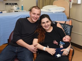Mom and dad of the 100th baby at AMGH, Paige Caperchione and Patrick Albiston. (Contributed photo)
