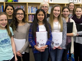 Amber Pridoehl, 13,  Janan Dean, Venus Osmani, 13, Eman Tanveer, 13, Peggy Sattler MPP, Sara Enns, 13, Adria Gioiosa, 13, Olivia Floris, 13, Kennedi Knoch, 13, and Mary Chamberlain Girls in government in London, Ont. (MIKE HENSEN, The London Free Press)