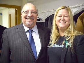 Sarnia-Lambton MPP Bob Bailey and Sarnia-Lambton Rebound's executive director Carrie McEachran are shown at the Hub's grand opening in May 2017. The group of agencies  providing services at the Hub for youth in Sarnia is seeking funding help to keep it open past March. (Handout)