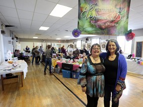 Wendy Oakley and Holly Benn are seen at the fourth annual International Woman’s Day event in Napanee on Saturday. (Meghan Balogh/The Whig-Standard/Postmedia Network)