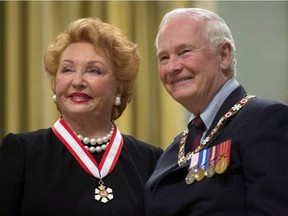 Governor General David Johnston promotes Jacqueline Desmarais within the Order of Canada during a ceremony at Rideau Hall Friday in 2013. Jacqueline Desmarais has died at age 89. (Adrian Wyld/Canadian Press file photo)