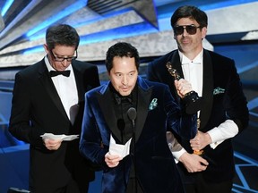 Production designers Jeff Melvin, Paul Denham Austerberry and Shane Vieau accept Best Production Design for 'The Shape of Water' onstage during the 90th Annual Academy Awards at the Dolby Theatre at Hollywood & Highland Center on March 4, 2018 in Hollywood, California. (Kevin Winter / Getty Images)