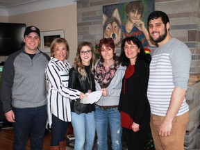 Representatives from 100 Women Who Care Sarnia-Lambton dropped off a $10,900 donation to the Deker Bauer Foundation for Suicide Prevention on Feb. 23. From left: Foundation advisor Devon Young, 100 Women's Linda VandenBroek, Foundation advisor Baylie Randall, Foundation CEO Theresa Ingles, 100 Women's Joanne Hines, and Foundation advisor Anthony Frijia. 
CARL HNATYSHYN/SARNIA THIS WEEK