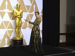 Frances McDormand, winner of the award for best performance by an actress in a leading role for "Three Billboards Outside Ebbing, Missouri", poses in the press room at the Oscars on Sunday, March 4, 2018, at the Dolby Theatre in Los Angeles. (Photo by Jordan Strauss/Invision/AP)