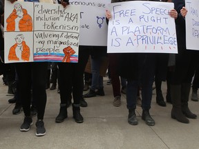 People protesting speaker Jordan Peterson gathered at Queen's University on Monday, March 6, 2018. Photo by Elliot Ferguson.