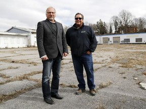 Luke Hendry/The Intelligencer
Ian Geenen, left, stands on a portion of the former Trudeau Motors property on Station Street in Belleville Tuesday. With him was real estate broker Jamie Troke. Geenen said he’s serving as an advisor on the project. It’s expected to become a 140-unit retirement home.