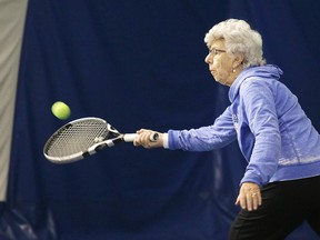 Joanne Pettit returns the ball during women's league action at the Sudbury Indoor Tennis Centre in Sudbury, Ont. on Tuesday March 6, 2018. Pettit  founded the women's league 25 years ago.Gino Donato/Sudbury Star/Postmedia Network