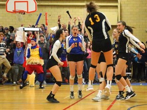 The Oakridge Oaks girls volleyball team celebrates their win in the semifinals over Frank Hayden SS, sending them to the OFSAA gold medal game at 5 p.m. on their home court Wednesday. Mike Hensen/The London Free Press/Postmedia Network